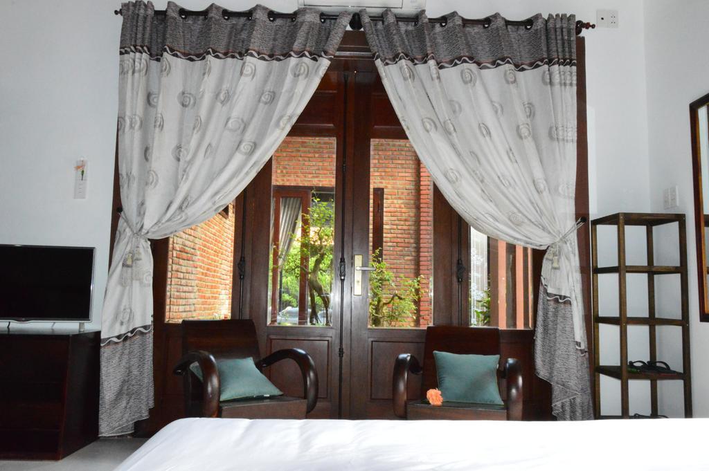 313 Cua Dai - Viet House Homestay Hoi An Quarto foto